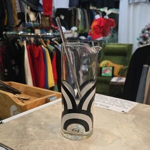 Elegant Black and White Glass Pitcher with Stirrer
